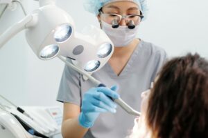 A female doctor is conducting dental checkup